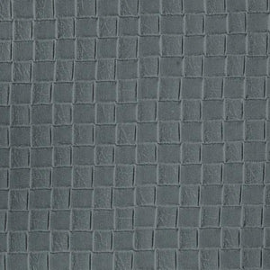 Close-up texture of a blue-toned vinyl material with a solid pattern.